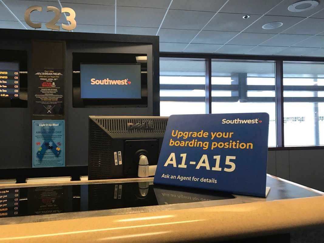 Sign that says Upgrade your Southwest boarding position A1-A15